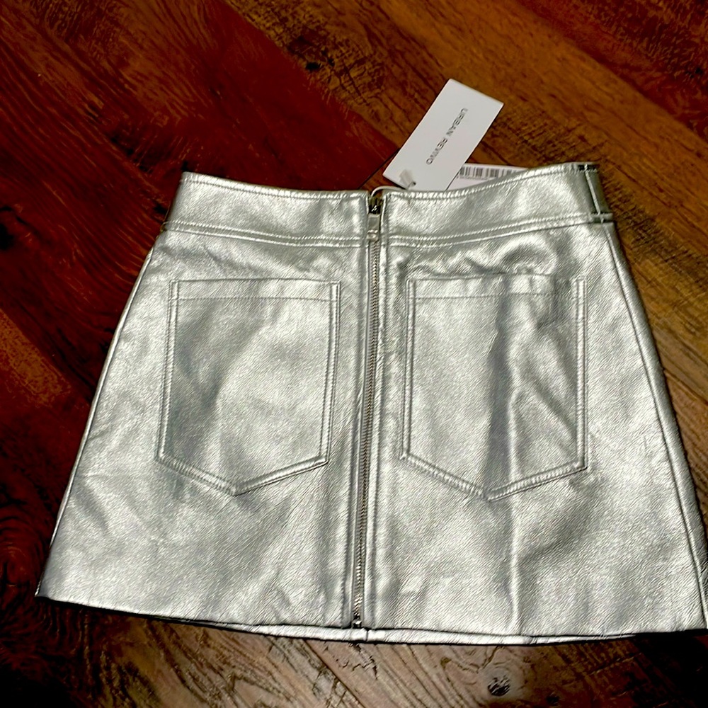Brand new silver leather like skirt